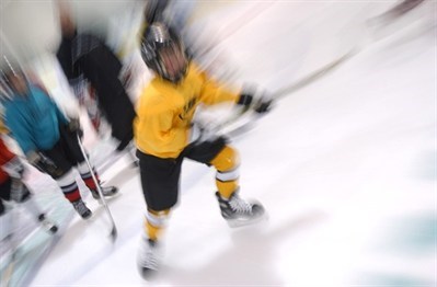 Hockey player skating on ice